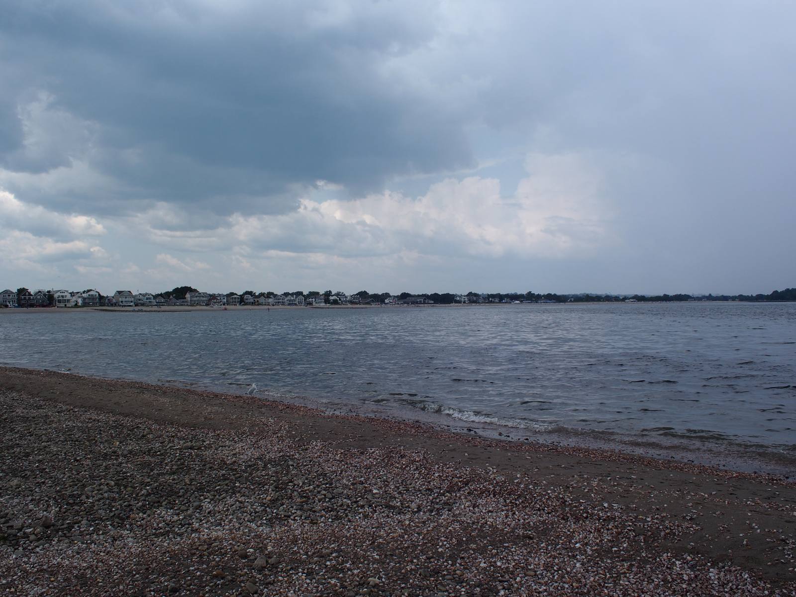 View across the water to homes along the Fairfield, Connecticut shoreline